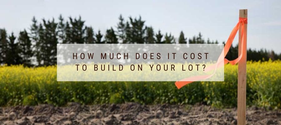 Image of a lot with a stake marking the size of the lot to build a home.
